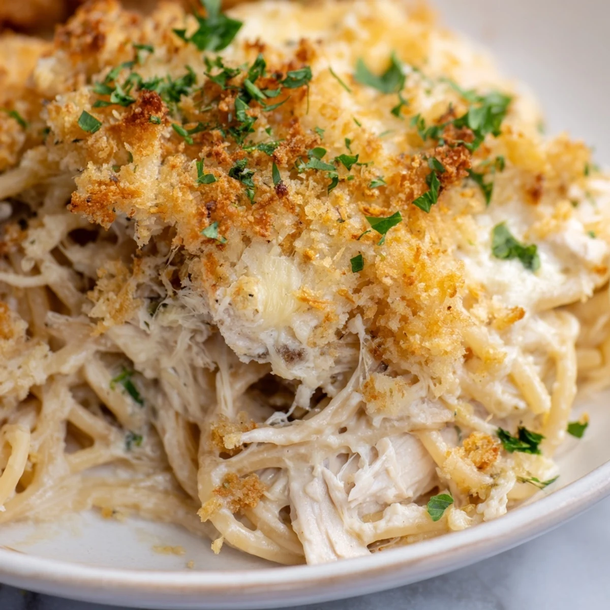Cheesy, creamy Turkey Tetrazzini boasts tender turkey and earthy mushrooms, perfect comfort food, ready to eat.