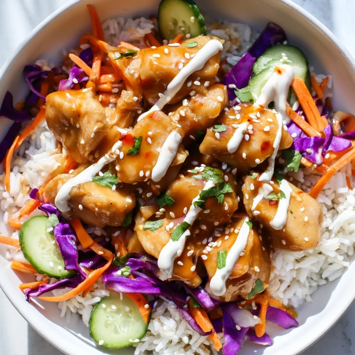 Juicy Marry Me Sweet Chili Chicken glazed in a savory sauce, served over rice with colorful vegetables and lime wedges for squeezing.