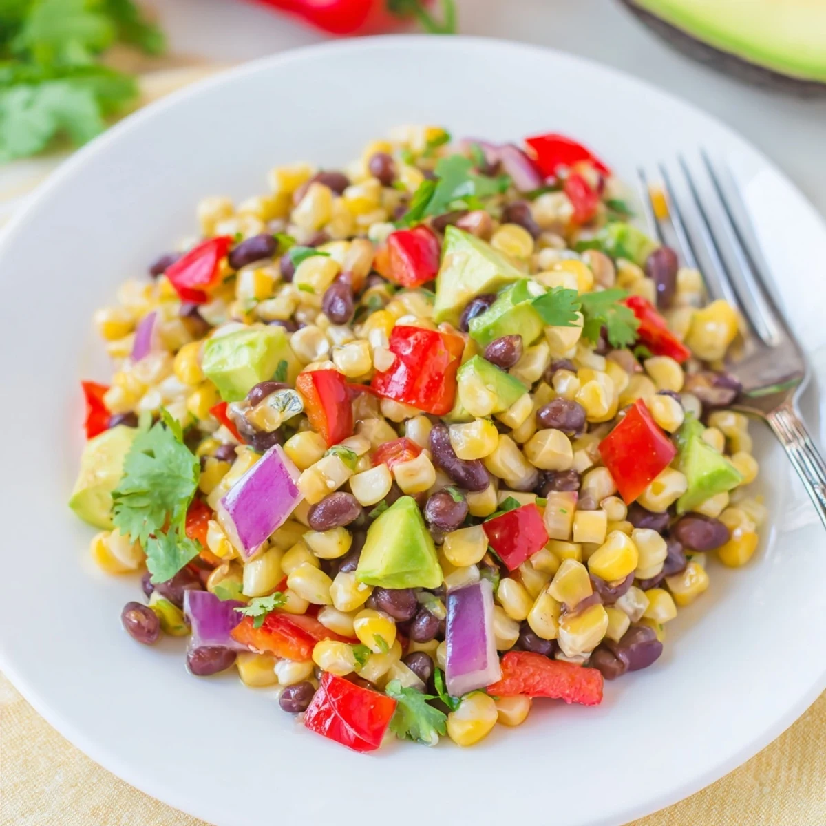 Fresh corn and black bean salad with crisp vegetables and cilantro