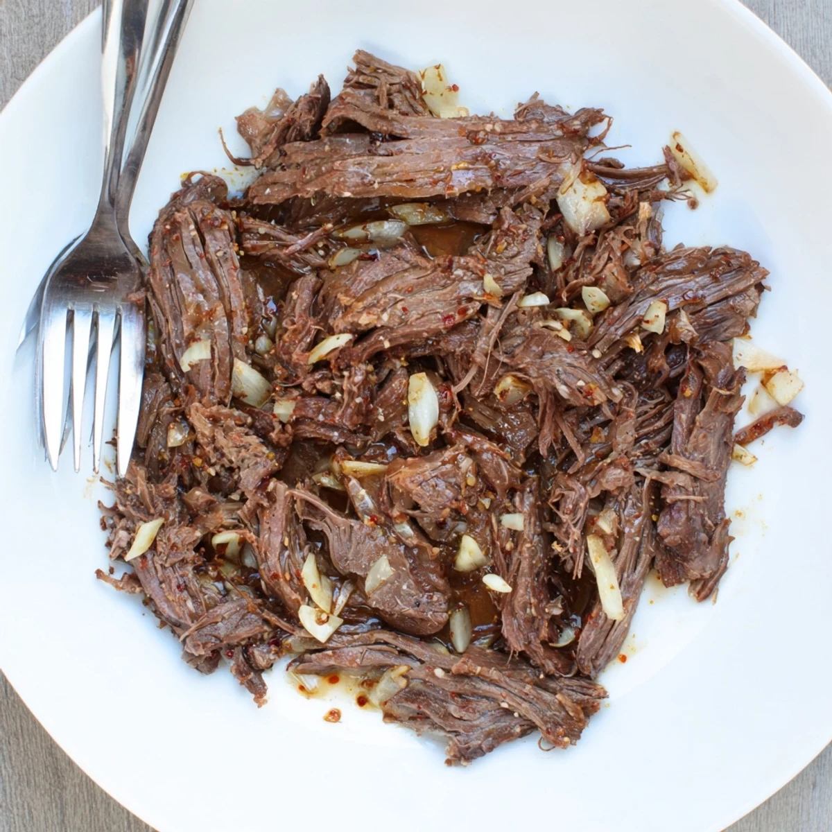 Mouthwatering Crock Pot shredded beef perfect for tacos, sandwiches, or hearty rice bowls