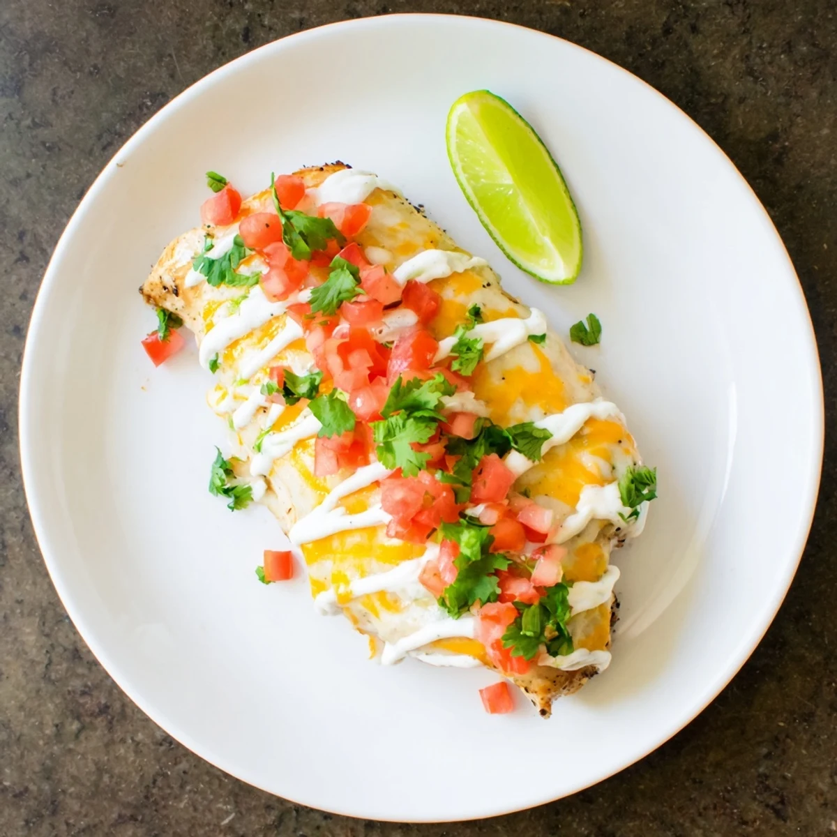 Zesty Fiesta Lime Chicken drizzled with creamy sauce and garnished with cilantro